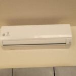AC leaning or Spitting water